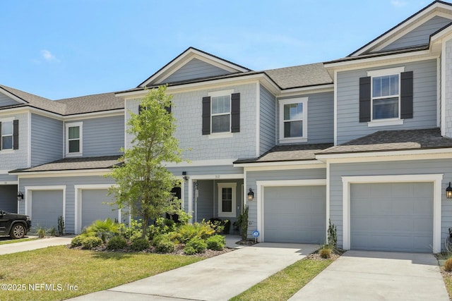 312 Anthony Dr, Jacksonville, FL 32218 - view of property with driveway, roof with shingles, and a garage