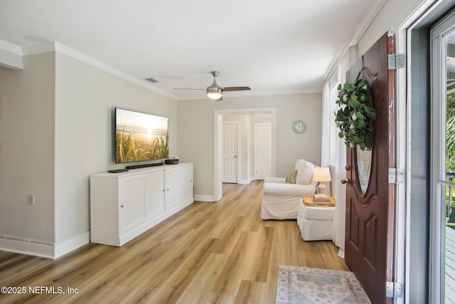 4068 Scenic Dr, Middleburg, FL 32068 - living area with a ceiling fan, baseboards, ornamental molding, and light wood finished floors