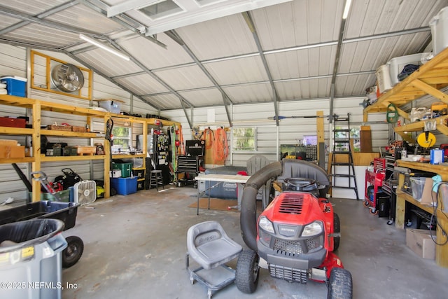 4068 Scenic Dr, Middleburg, FL 32068 - garage featuring a workshop area