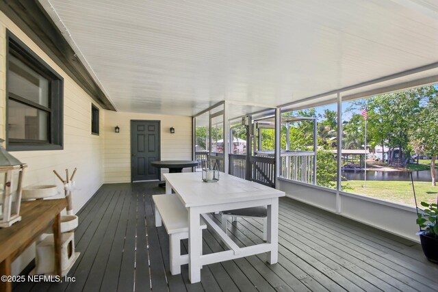 4068 Scenic Dr, Middleburg, FL 32068 - sunroom / solarium featuring outdoor dining area, a water view, and a healthy amount of sunlight