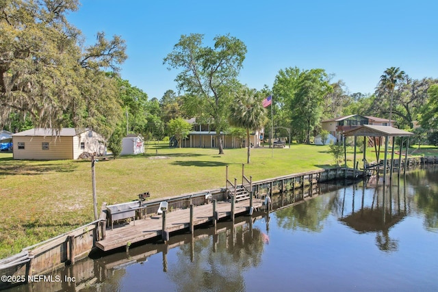 4068 Scenic Dr, Middleburg, FL 32068 - dock area with a lawn, boat lift, and a water view