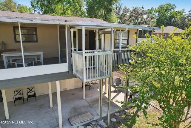 4068 Scenic Dr, Middleburg, FL 32068 - rear view of property with a patio area and a shingled roof