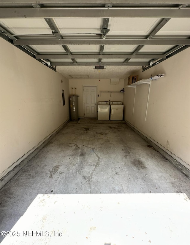 1422 Ellis Trace Dr, Jacksonville, FL 32205 - garage featuring water heater, independent washer and dryer, electric panel, and a garage door opener