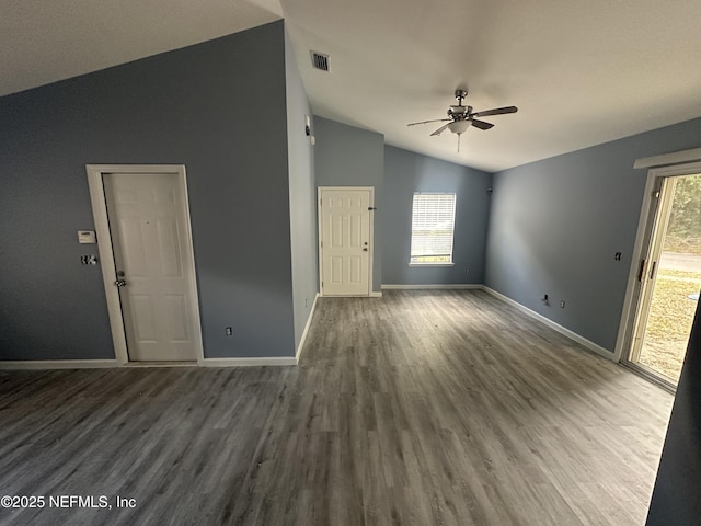 1422 Ellis Trace Dr, Jacksonville, FL 32205 - unfurnished living room featuring baseboards, visible vents, lofted ceiling, wood finished floors, and ceiling fan