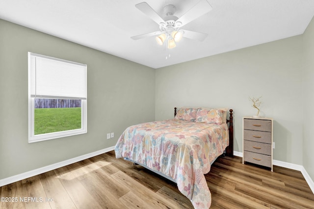 2925 Bradford St, Saint Augustine, FL 32084 - bedroom with wood finished floors, baseboards, and ceiling fan