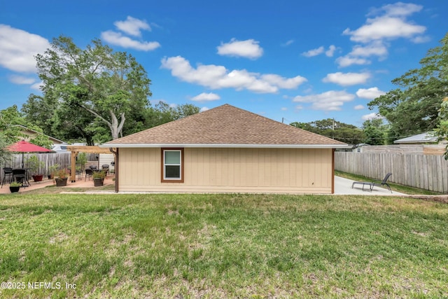 2925 Bradford St, Saint Augustine, FL 32084 - view of property exterior with a yard, a shingled roof, and a patio