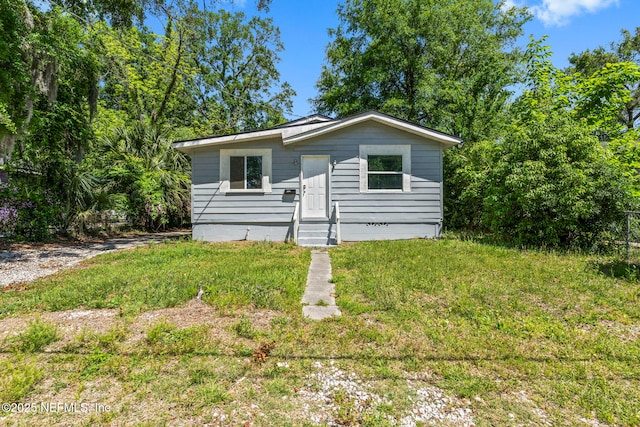 1585 W 31st St, Jacksonville, FL 32209 - view of front of home featuring entry steps and a front yard