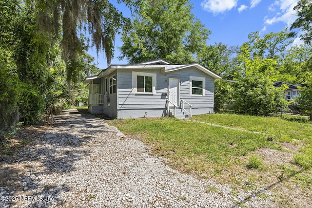 1585 W 31st St, Jacksonville, FL 32209 - view of front of home with driveway and entry steps