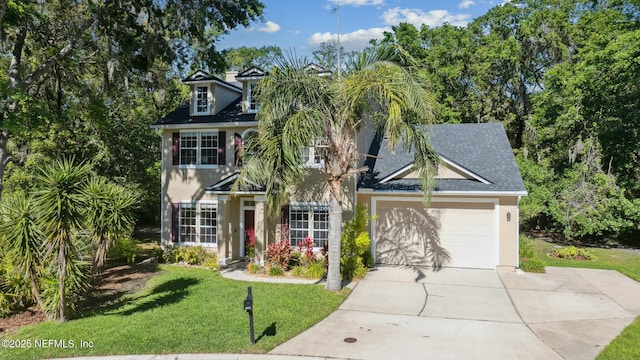 colonial-style house with a garage, driveway, a front yard, and stucco siding