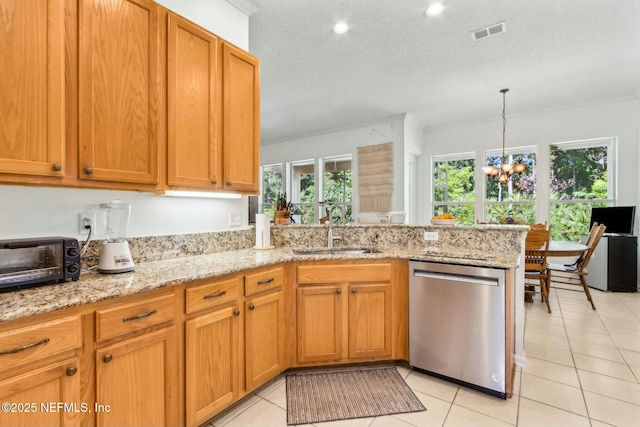 kitchen with a sink, dishwasher, a toaster, a peninsula, and visible vents