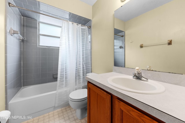 bathroom featuring toilet, tile patterned floors, shower / bath combination with curtain, and vanity