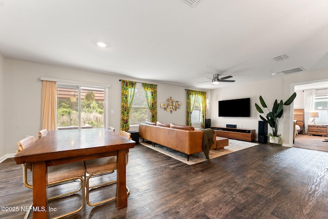 11476 Sheepshead Ln, Jacksonville, FL 32226 - living area featuring wood finished floors, a ceiling fan, and baseboards