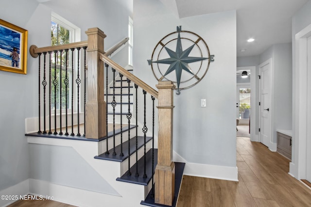 548 Sea Island Dr, Fernandina Beach, FL 32034 - stairway with plenty of natural light, wood finished floors, baseboards, and recessed lighting