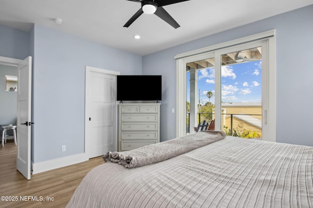 548 Sea Island Dr, Fernandina Beach, FL 32034 - bedroom with access to exterior, wood finished floors, recessed lighting, baseboards, and a ceiling fan