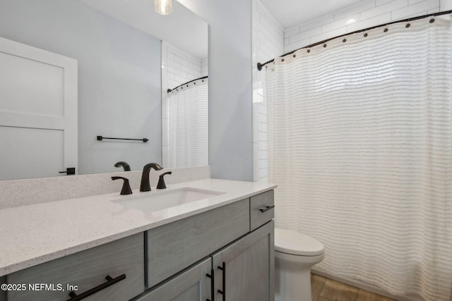 548 Sea Island Dr, Fernandina Beach, FL 32034 - bathroom featuring toilet, vanity, and curtained shower