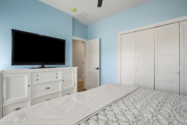548 Sea Island Dr, Fernandina Beach, FL 32034 - bedroom featuring a closet and a ceiling fan