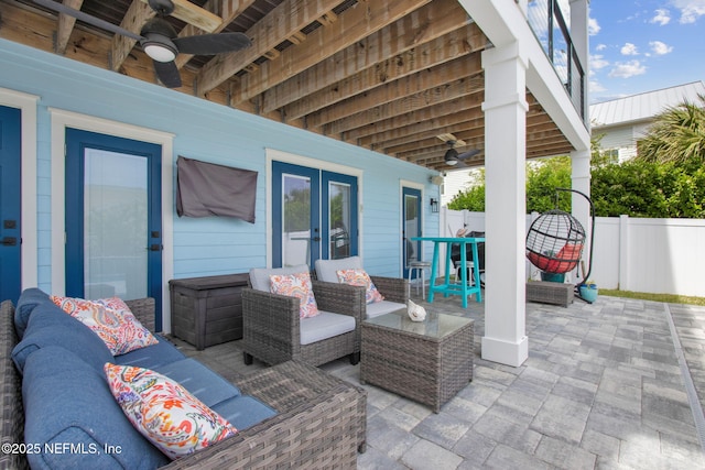 548 Sea Island Dr, Fernandina Beach, FL 32034 - view of patio featuring a ceiling fan, an outdoor living space, fence, and french doors