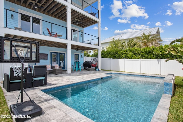 548 Sea Island Dr, Fernandina Beach, FL 32034 - view of swimming pool featuring a patio, french doors, an outdoor living space, a fenced backyard, and a ceiling fan