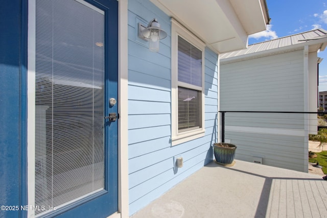 548 Sea Island Dr, Fernandina Beach, FL 32034 - doorway to property featuring metal roof