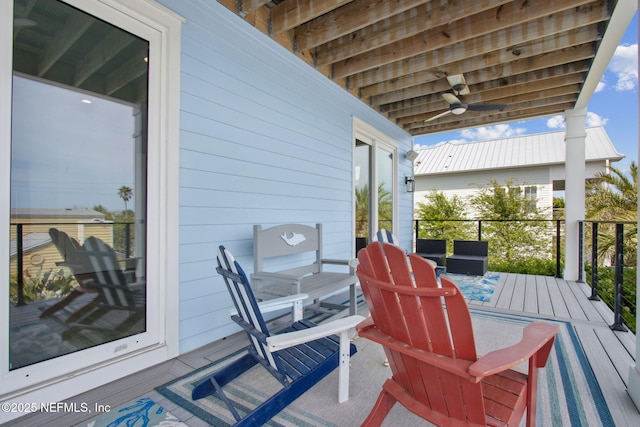 548 Sea Island Dr, Fernandina Beach, FL 32034 - wooden deck with a ceiling fan