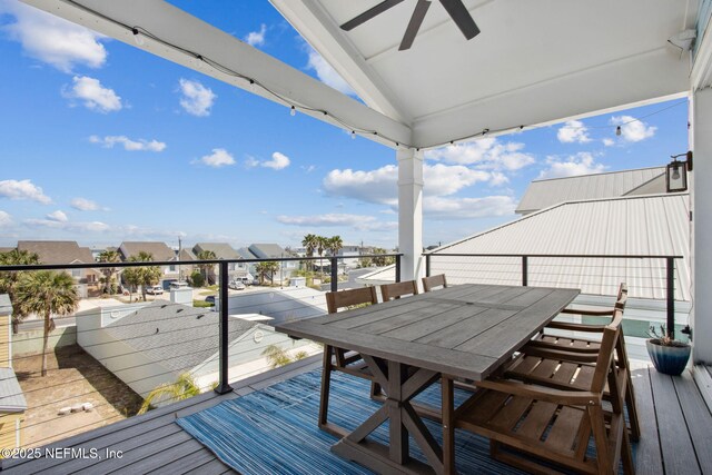 548 Sea Island Dr, Fernandina Beach, FL 32034 - balcony with ceiling fan, a residential view, and outdoor dining area
