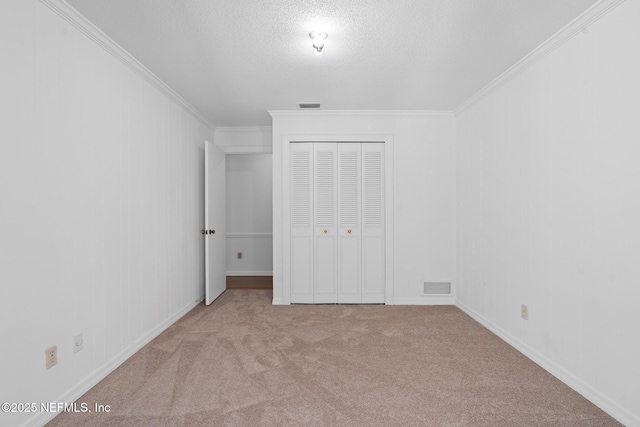 1228 Old Mill Rd, Orlando, FL 32806 - unfurnished bedroom featuring carpet floors, crown molding, and visible vents