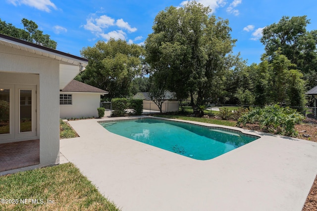 1228 Old Mill Rd, Orlando, FL 32806 - view of pool featuring a fenced in pool, a fenced backyard, and a patio area