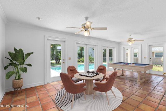1228 Old Mill Rd, Orlando, FL 32806 - recreation room with crown molding, billiards, baseboards, and light tile patterned flooring