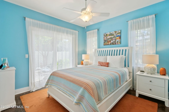 111 Cherry St, Neptune Beach, FL 32266 - bedroom featuring ceiling fan, baseboards, and multiple windows