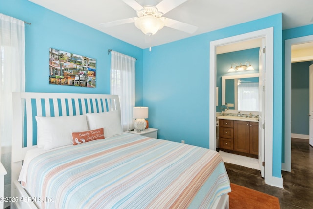 111 Cherry St, Neptune Beach, FL 32266 - bedroom with concrete flooring, baseboards, and ensuite bathroom