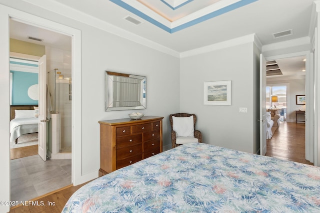 111 Cherry St, Neptune Beach, FL 32266 - bedroom featuring wood finished floors, visible vents, and crown molding