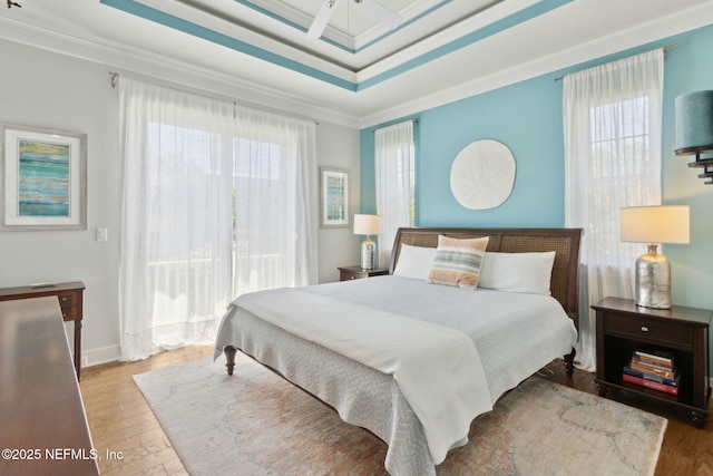 111 Cherry St, Neptune Beach, FL 32266 - bedroom with ornamental molding, wood finished floors, and access to outside