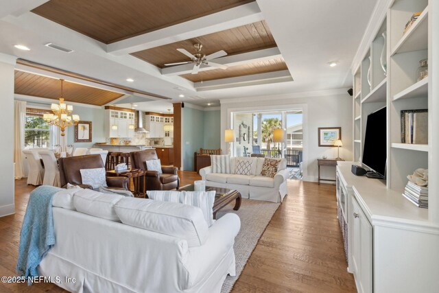 111 Cherry St, Neptune Beach, FL 32266 - living area featuring wood finished floors, wooden ceiling, visible vents, and ceiling fan with notable chandelier