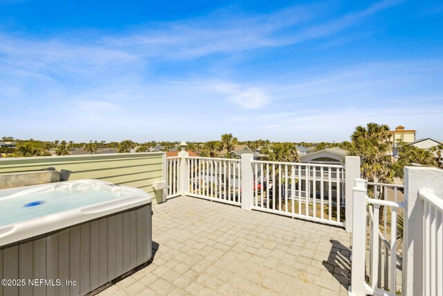 111 Cherry St, Neptune Beach, FL 32266 - view of patio featuring central air condition unit and a hot tub