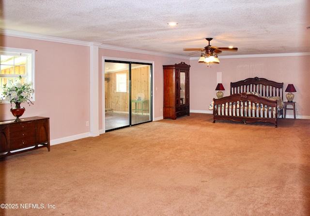 bedroom featuring baseboards, ornamental molding, a textured ceiling, and carpet