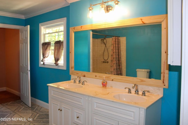 full bathroom featuring curtained shower, baseboards, ornamental molding, and a sink