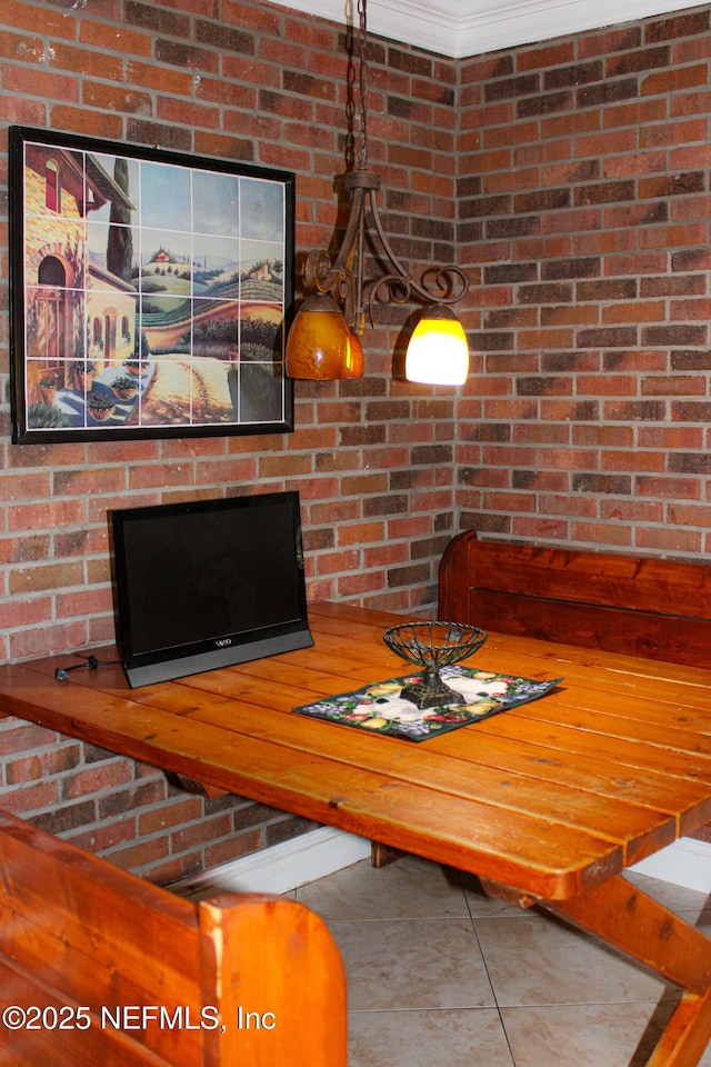 dining area featuring tile patterned floors