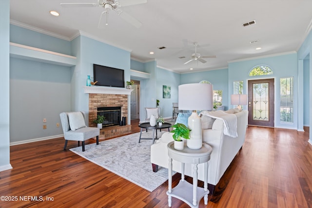 living area featuring visible vents, recessed lighting, ceiling fan, and wood finished floors