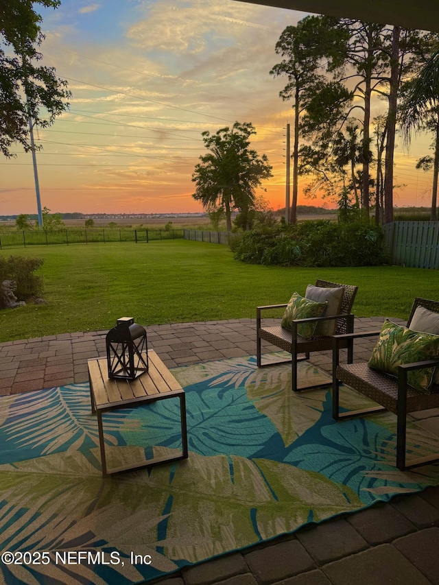 2046 Marye Brant Loop S, Neptune Beach, FL 32266 - patio terrace at dusk with a patio area