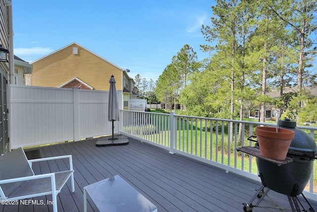 deck featuring a yard