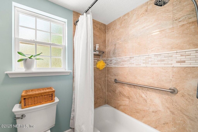 bathroom with shower / bath combo with shower curtain and toilet