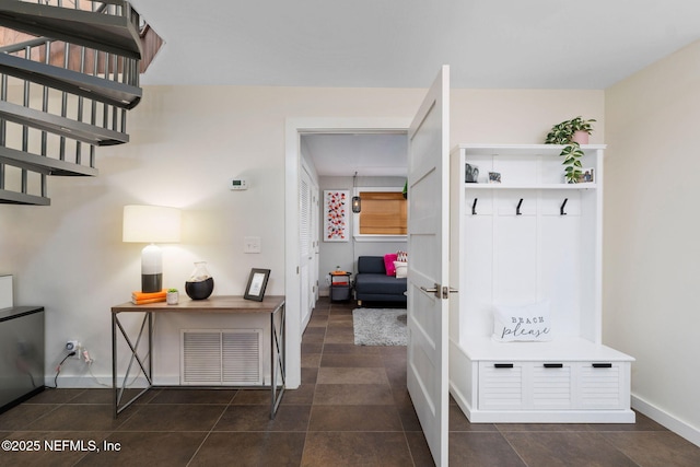 2740 Loja St, Saint Augustine, FL 32084 - mudroom featuring baseboards, visible vents, and dark tile patterned floors