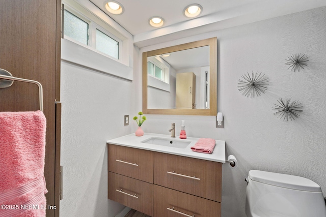 2740 Loja St, Saint Augustine, FL 32084 - bathroom with recessed lighting, toilet, and vanity