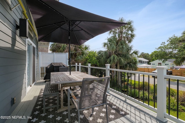 2740 Loja St, Saint Augustine, FL 32084 - wooden terrace with area for grilling and outdoor dining area