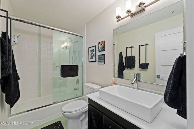 2740 Loja St, Saint Augustine, FL 32084 - full bathroom featuring enclosed tub / shower combo, toilet, and vanity