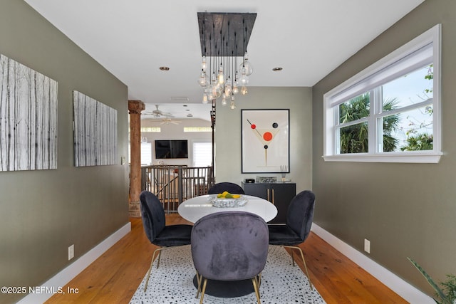2740 Loja St, Saint Augustine, FL 32084 - dining area featuring a ceiling fan, wood finished floors, and baseboards