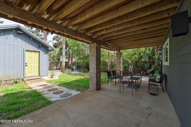 2740 Loja St, Saint Augustine, FL 32084 - view of patio / terrace with a fenced backyard and outdoor dining area
