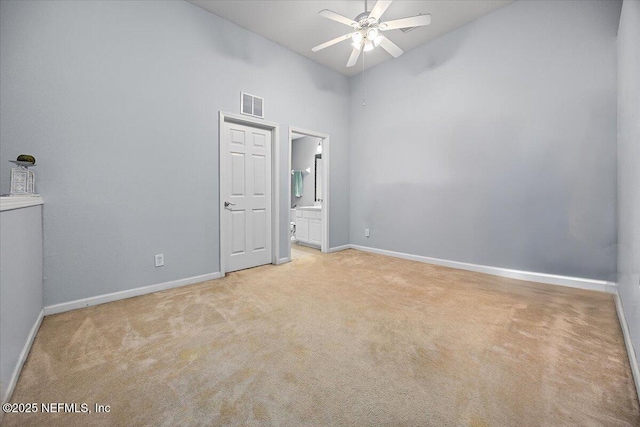 13529 Stone Pond Dr, Jacksonville, FL 32224 - unfurnished bedroom featuring light colored carpet, baseboards, high vaulted ceiling, and ensuite bathroom