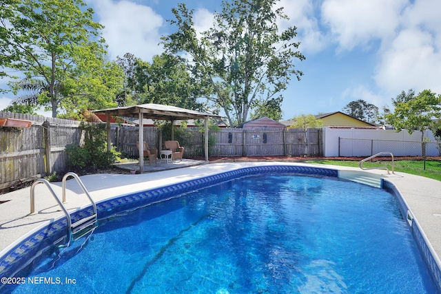 view of pool with a patio area, a fenced in pool, and a fenced backyard