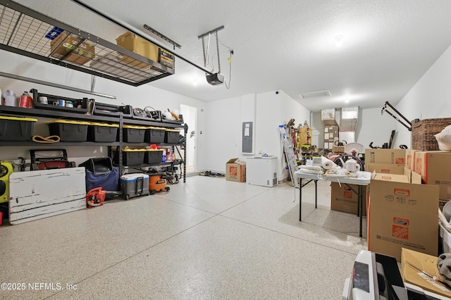 177 Windwalker Dr, Saint Augustine, FL 32092 - garage with electric panel and a garage door opener